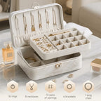 2-layer lockable jewelry box storage capacity – 16 rings, 8 necklaces, 12 pairs of earrings, 6 bracelets and 1 long chain