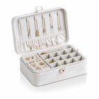 White 2-layer lockable jewelry box with embossed PU leather and gold clasp, open view with jewelry