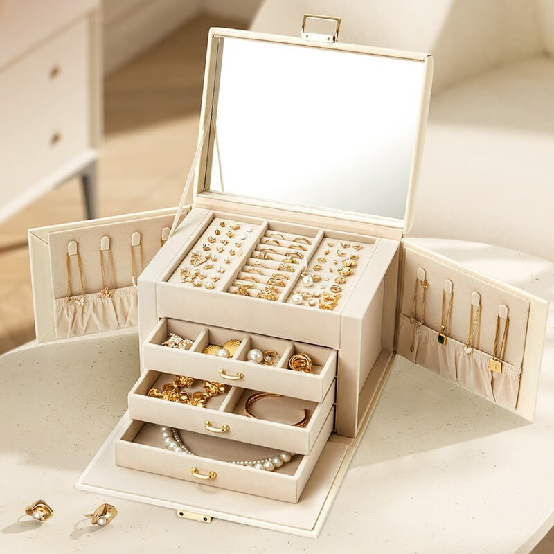 3-layer jewelry box left side open showing necklace hooks and drawers