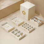 Large jewelry box with all 5 drawers removed and laid out flat