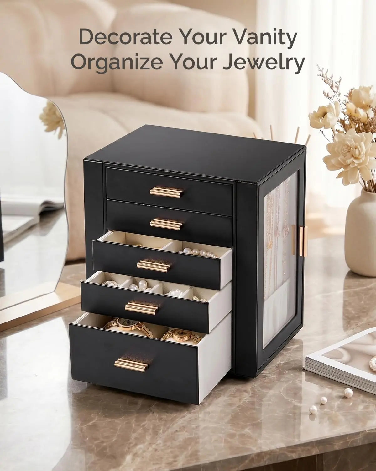 Black 5-drawer jewelry box styled on a vanity with open drawers displaying watches and bracelets.