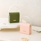 Handbag jewelry box lifestyle scene on vanity table