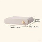 A cream white leather jewelry box with text showing product dimensions in both centimeters and inches.