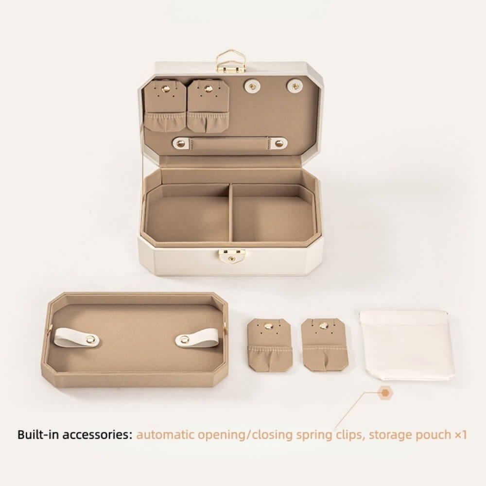Octagon jewelry box open with removable tray, earring cards and storage pouch laid out flat