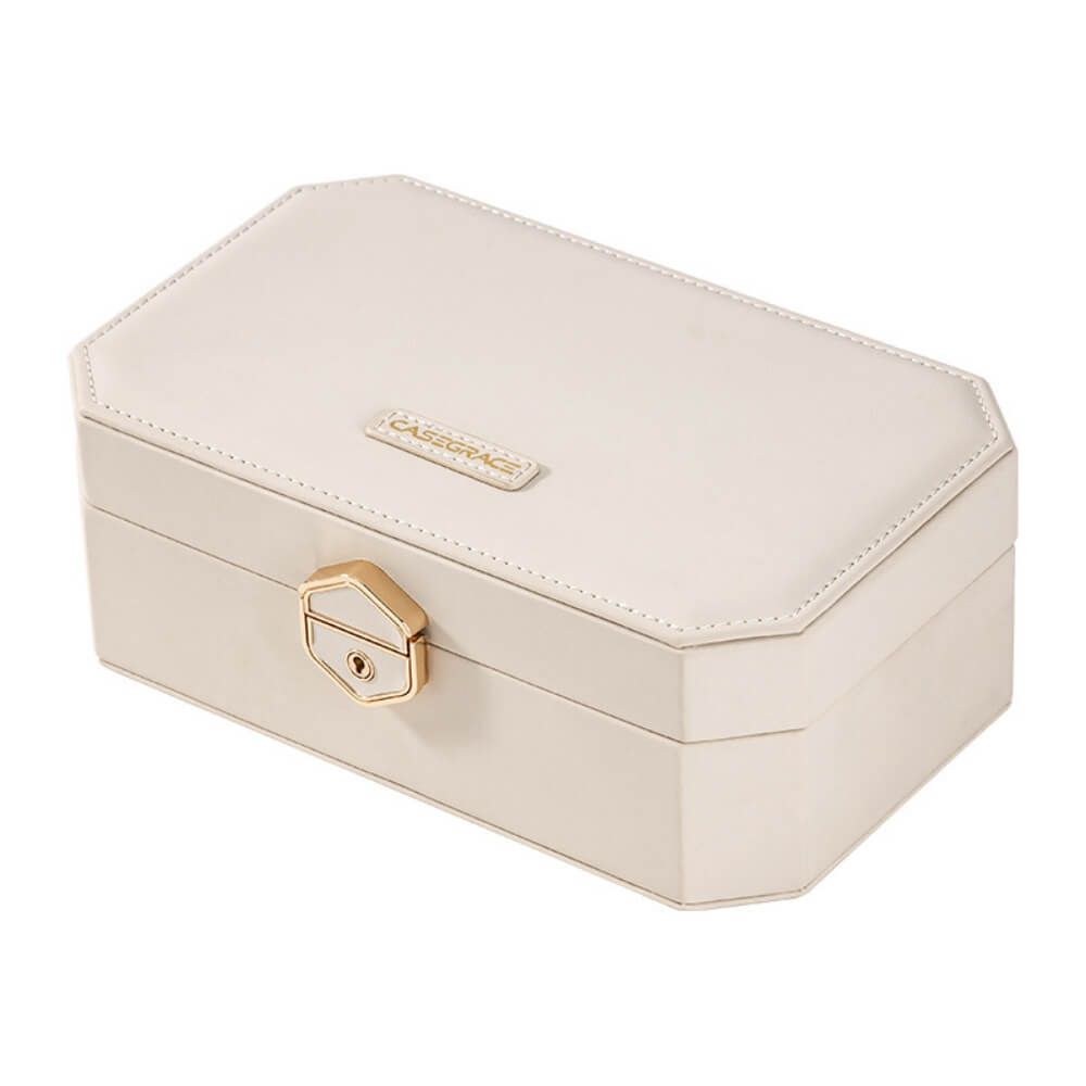 White octagon PU leather jewelry box with gold lock, closed front view